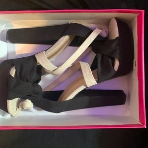 7.5 size strap tie 5.5” heels never worn brand new from shoe dazzle